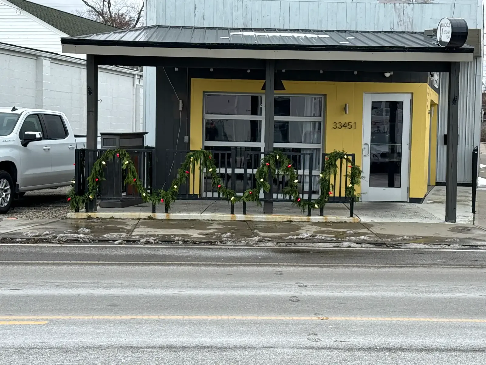 Storefront lighting installation in daylight in Avon Lake, a Shoreline project