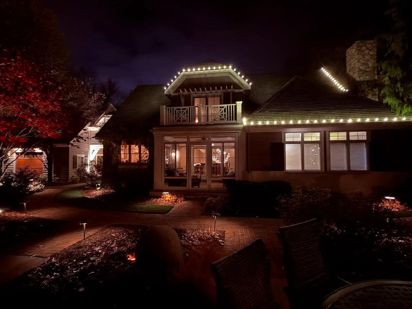 Illuminated entrance and upper roofline in Avon Lake, a Shoreline project