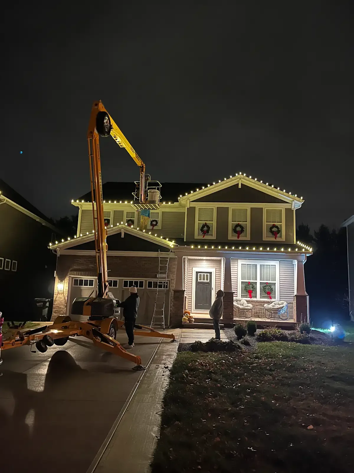 Roofline installation work at dusk in Avon Lake, a Shoreline project