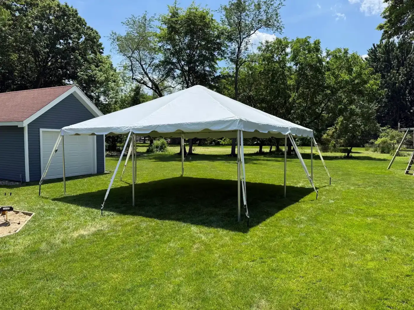 Side view of the backyard tent in Avon, a Shoreline project
