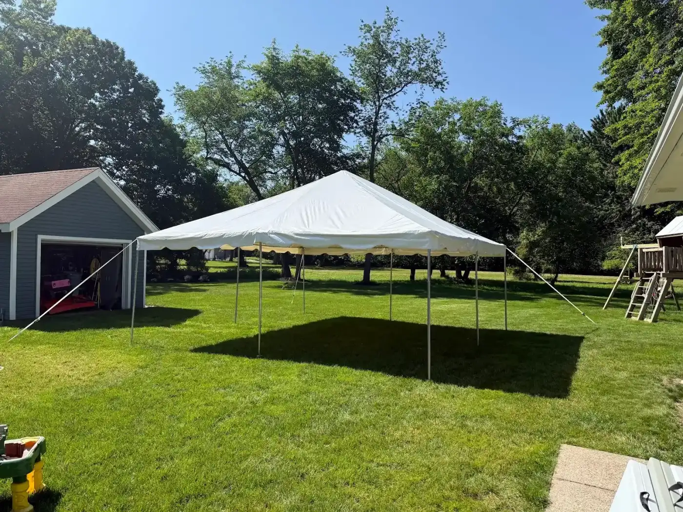 Open tent setup on the lawn in Avon, a Shoreline project