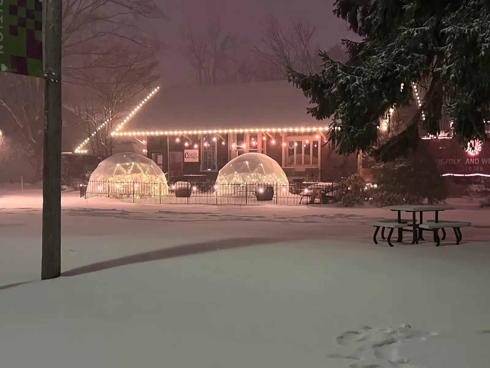 Winter lighting across Chatty’s Pizza patio in Bay Village, a Shoreline project