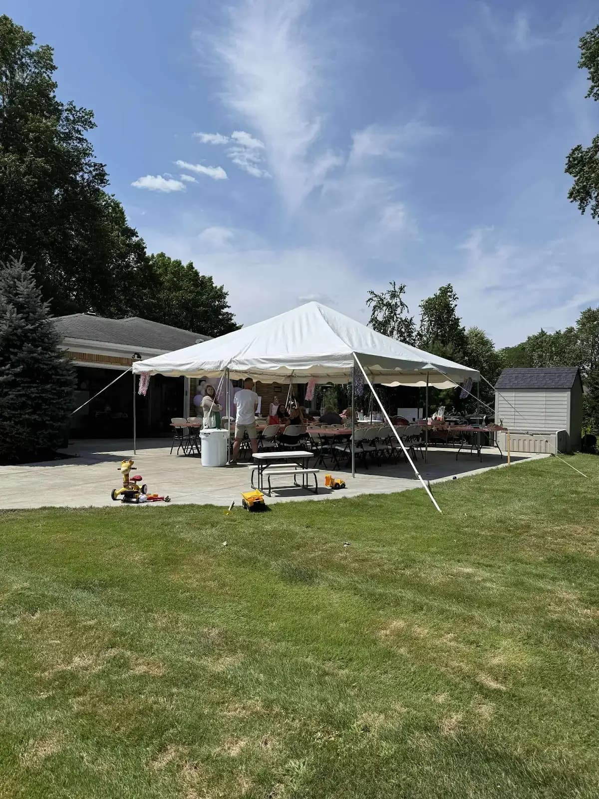 Patio tent and backyard seating in Independence, a Shoreline project