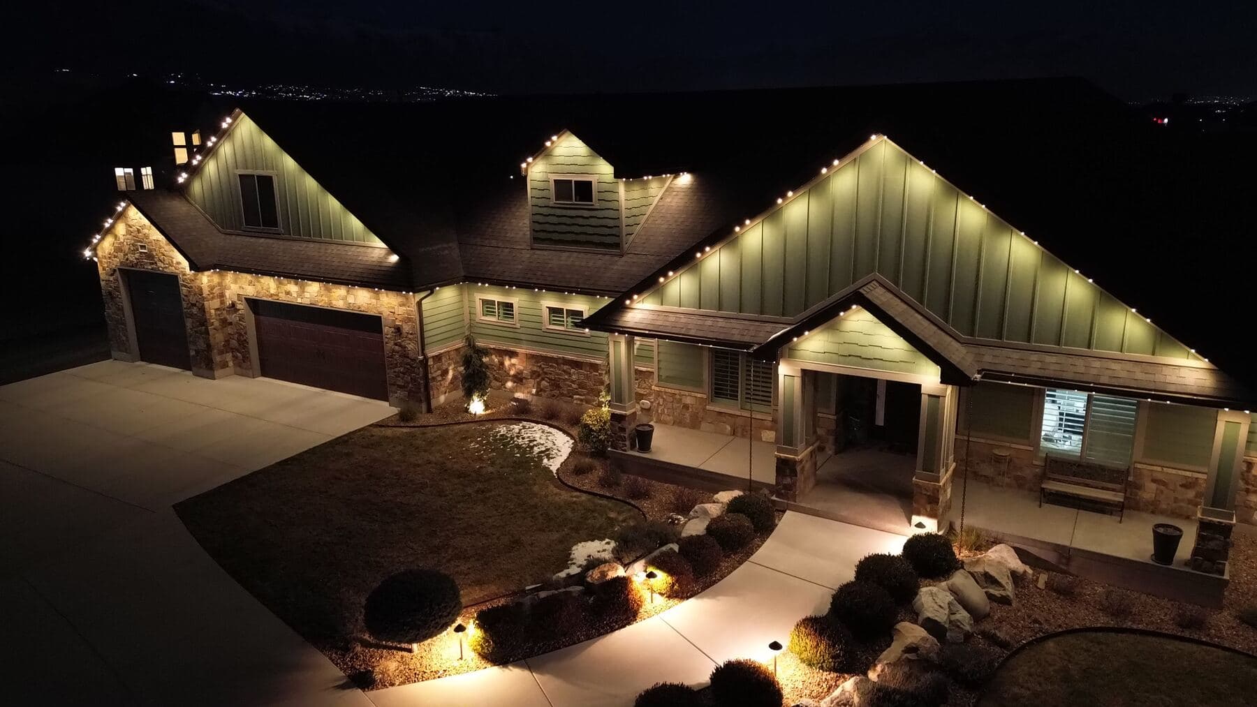 Warm white across a home’s roofline